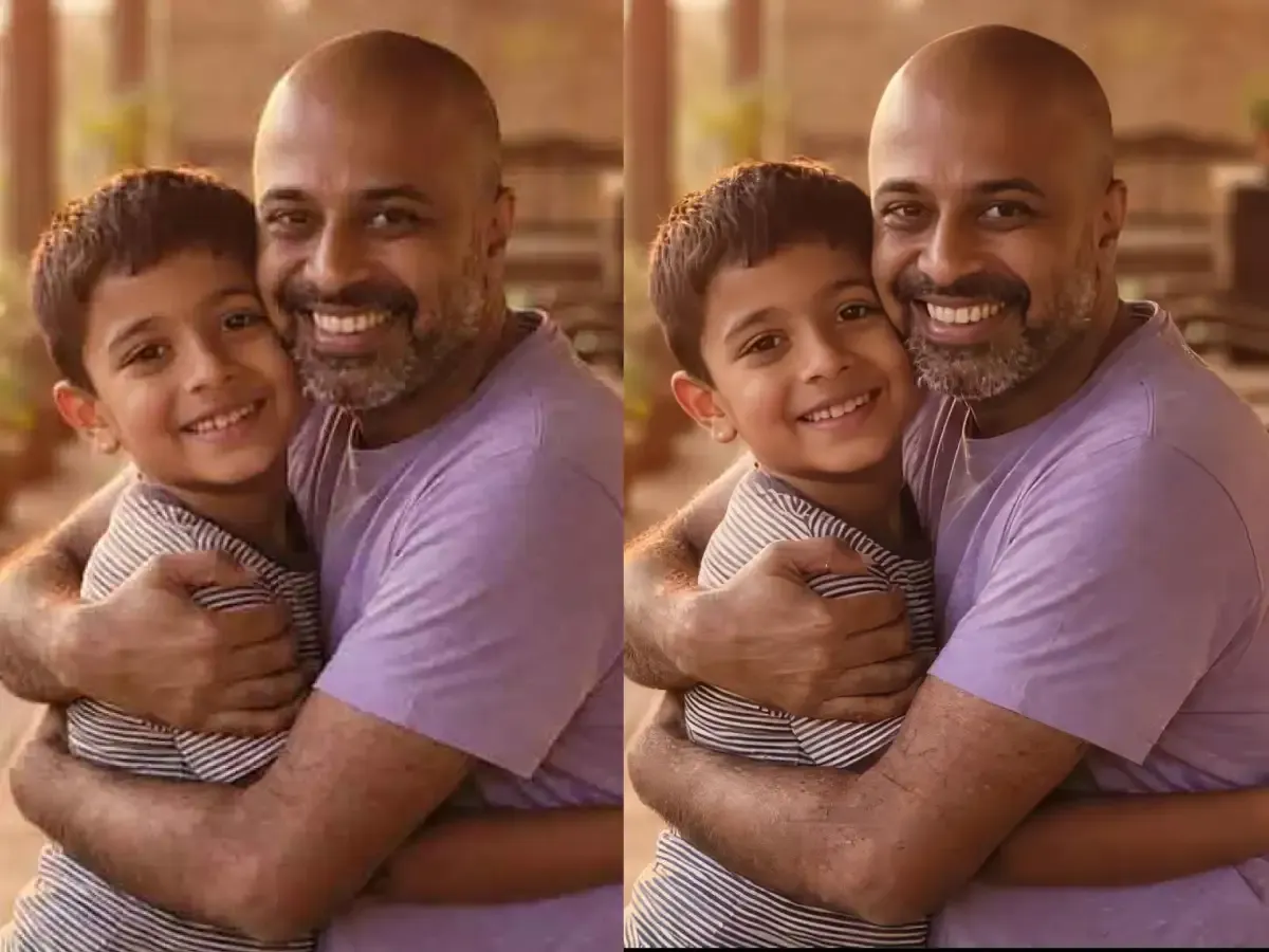 Image Upscaler 4K old photo restoration — father and son portrait recovered with generative upscale